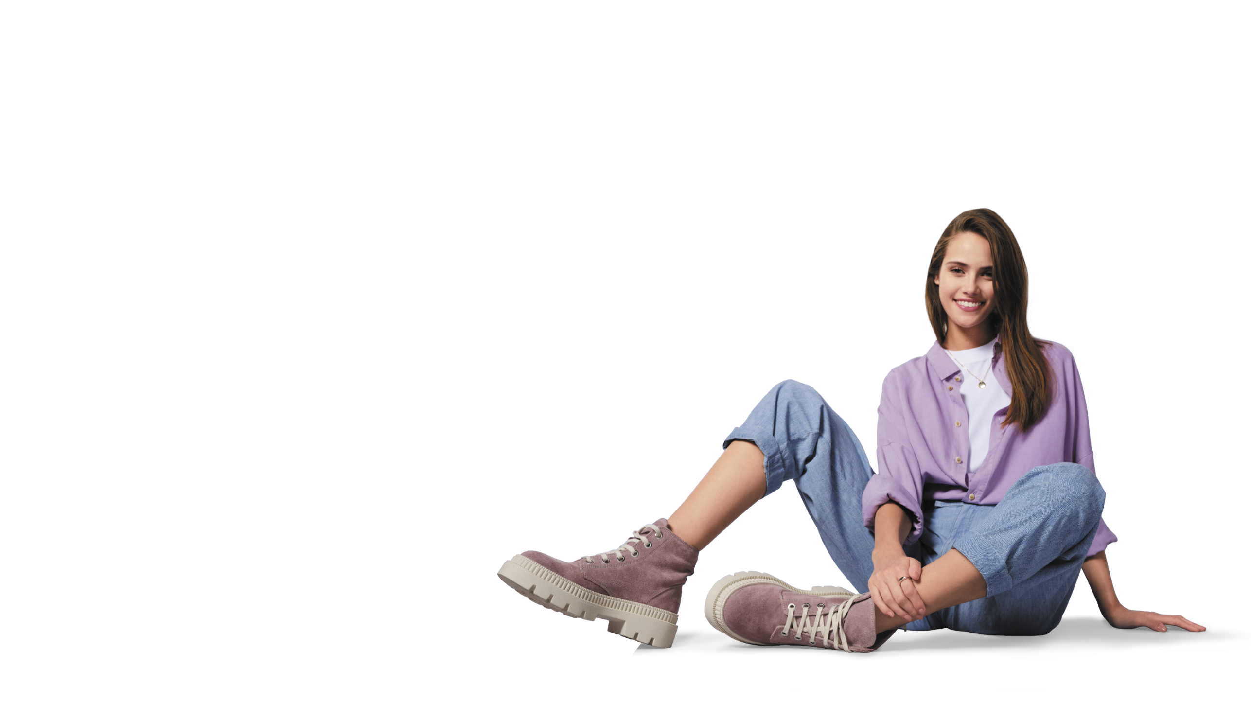 Woman sitting wearing Bata boots